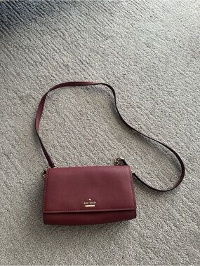 kate spade burgundy crossbody bag with gold hardware